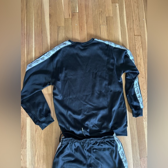 New in the bag black sweatshirt and sweatpants sealed in package.  Sz S, Med, XL - Picture 7 of 13